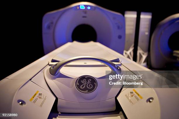 General Electric Co. Logo is seen on a Discovery CT750 HD CT scan machine as it sits on display prior to a news conference in New York, U.S., on...