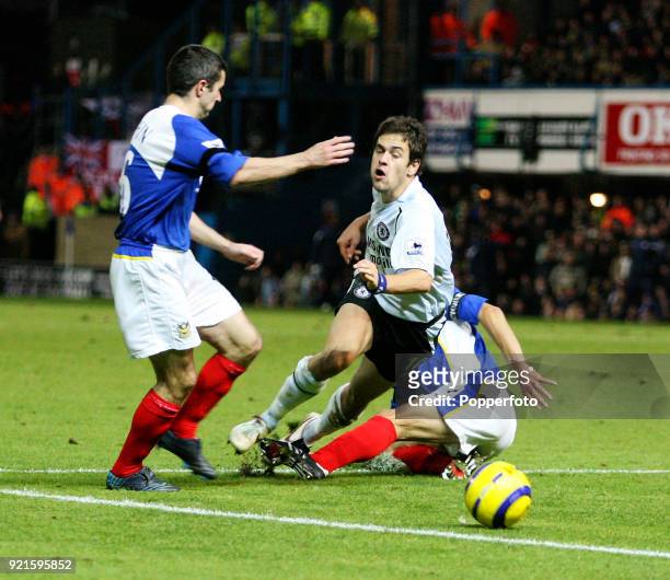 Dejan Stefanovic of Portsmouth brings down Joe Cole of Chelsea on the edge of the box resulting in a penalty to Chelsea during the Barclays...