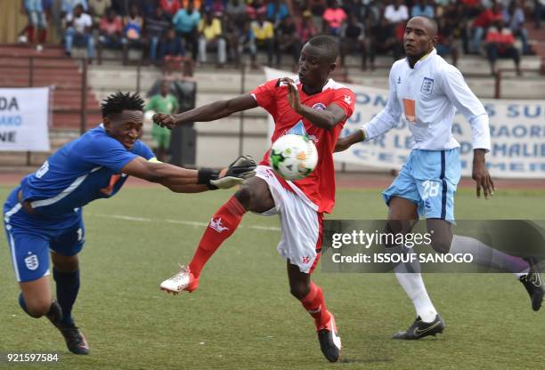 Williamsville's Roland Irie fights for the ball with Stade Malien's goalkeeper Djigui Diarra and Issaka Eliasssou during the CAF Champions league...