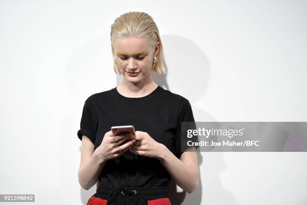 Model backstage ahead of the On|Off Presents show during London Fashion Week February 2018 at BFC Show Space on February 20, 2018 in London, England.