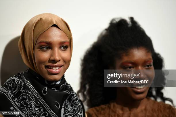 Models are seen backstage ahead of the On|Off Presents show during London Fashion Week February 2018 at BFC Show Space on February 20, 2018 in...