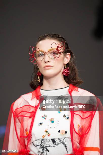 Model walks the runway at the On|Off Presents - Longshaw Ward show during London Fashion Week February 2018 at BFC Show Space on February 20, 2018 in...