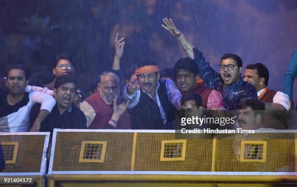Delhi BJP workers led by the President Manoj Tiwari protest outside the residence of Chief Minister Arvind Kejriwal against the violent assault on...