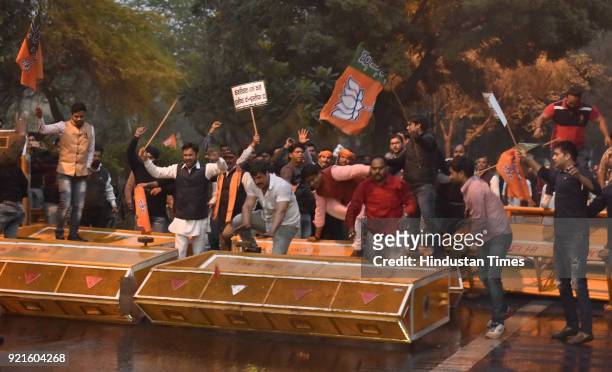Delhi BJP workers protest outside the residence of Chief Minister Arvind Kejriwal against the violent assault on the Chief Secretary Anshu Prakash on...