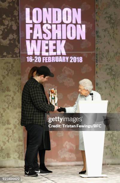 Queen Elizabeth II awards designer Richard Quinn the inaugural Queen Elizabeth II award for British Design alongside Chief Executive of the British...