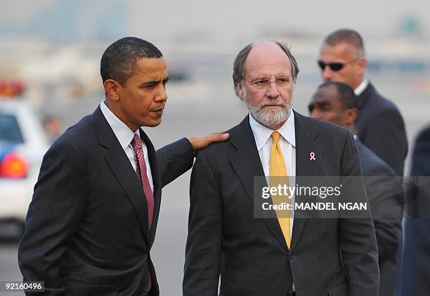 President Barack Obama walks with Governor Jon Corzine October 21, 2009 upon arrival at Newark International Airport, in Newark, New Jersey. Obama...