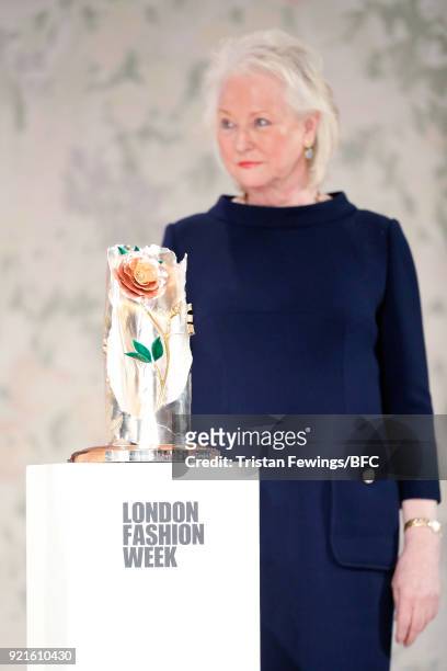 Royal dressmaker Angela Kelly poses with the Inaugural Queen Elizabeth II award for British Design at London Fashion Week on February 20, 2018 in...