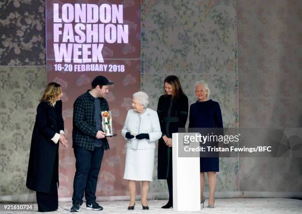 Queen Elizabeth II awards designer Richard Quinn the inaugural Queen Elizabeth II award for British Design alongside Chief Executive of the British...