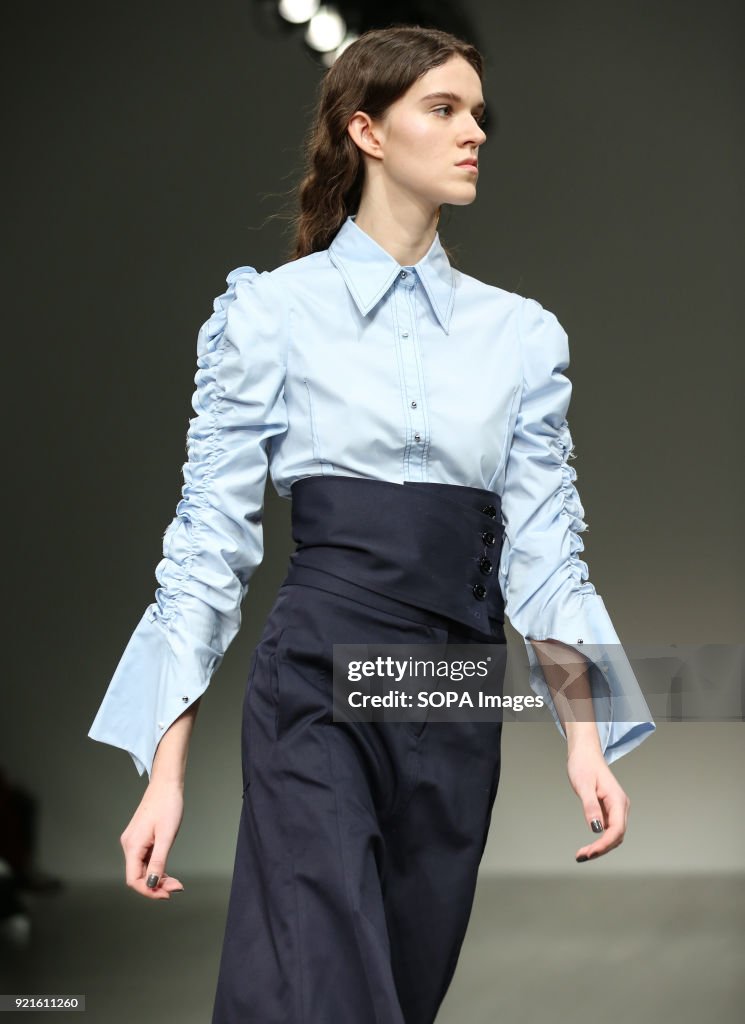 A model walks the runway at the Eudon Choi Show during...