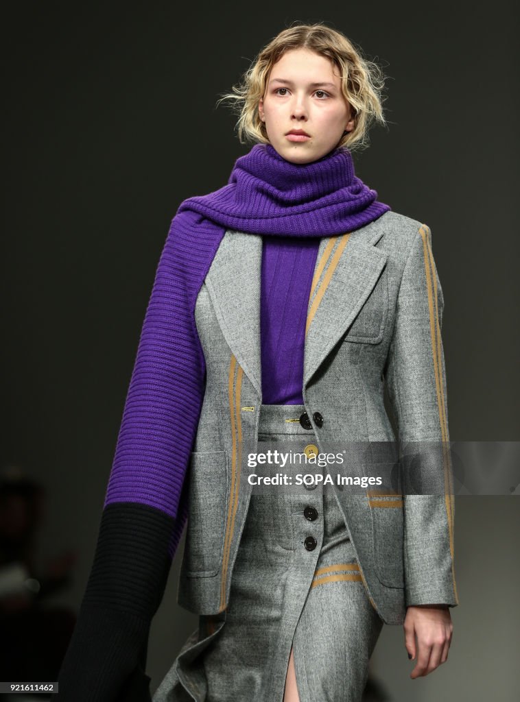 A model walks the runway at the Eudon Choi Show during...