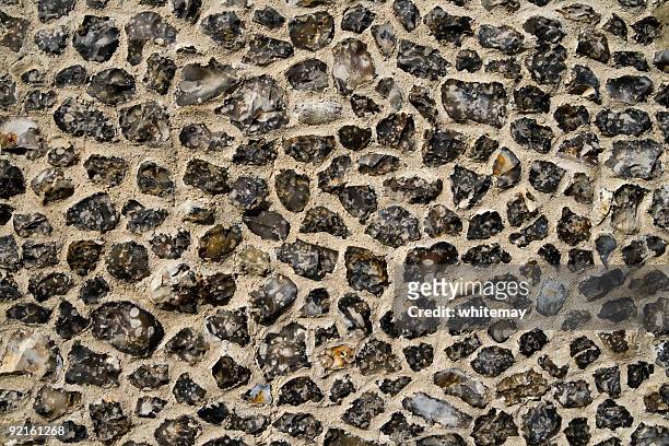knapped flint wall - flint stock pictures, royalty-free photos & images