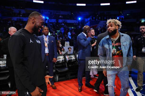Bradley Beal of the of team Stephen talks with Odell Beckham Jr. During the NBA All-Star Game as a part of 2018 NBA All-Star Weekend at STAPLES...