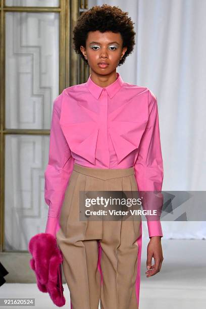 Model Poppy Okotcha walks the runway at the Delpozo Ready to Wear Fall/Winter 2018-2019 fashion show during London Fashion Week February 2018 on...