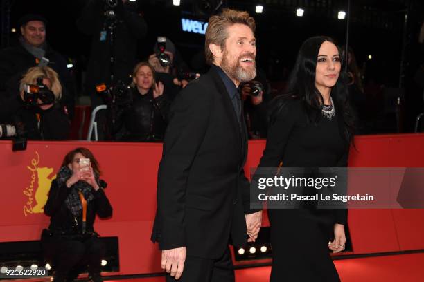 Willem Dafoe and his wife Giada Colagrande attend the Hommage Willem Dafoe - Honorary Golden Bear award ceremony and 'The Hunter' screening during...