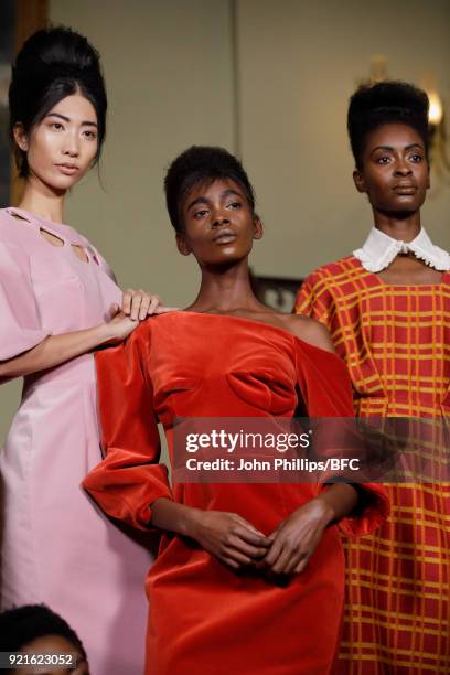 Models pose at the Tata Naka Presentation during London Fashion Week February 2018 on February 20, 2018 in London, England.