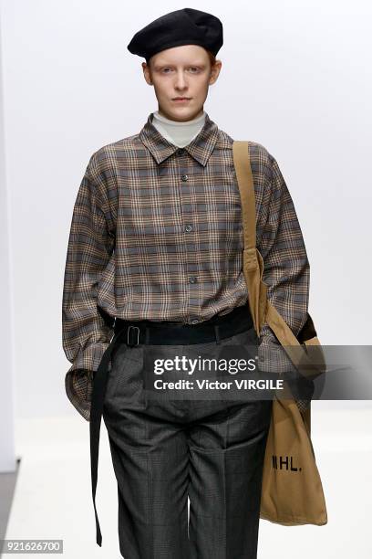 Model walks the runway at the Margaret Howell Ready to Wear Fall/Winter 2018-2019 fashion show during London Fashion Week February 2018 on February...