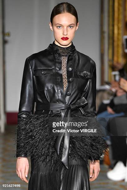 Model walks the runway at the Huishan Zhang Ready to Wear Fall/Winter 2018-2019 fashion show during London Fashion Week February 2018 on February 18,...