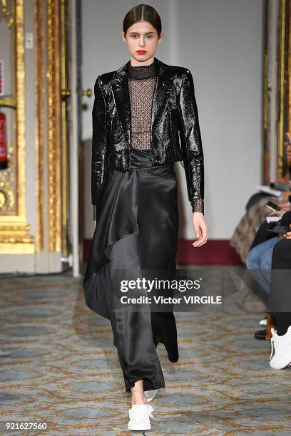 Model walks the runway at the Huishan Zhang Ready to Wear Fall/Winter 2018-2019 fashion show during London Fashion Week February 2018 on February 18,...