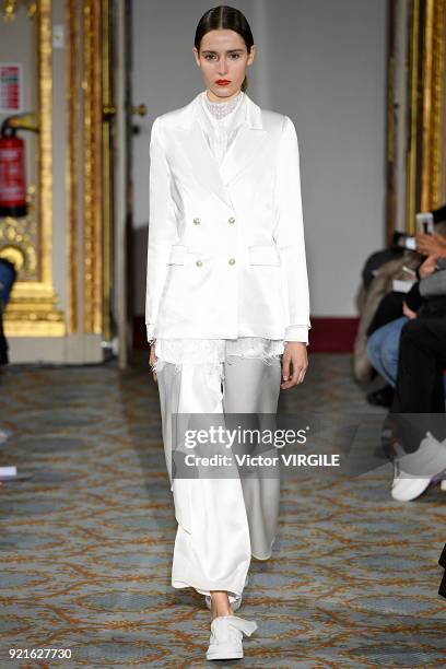 Model walks the runway at the Huishan Zhang Ready to Wear Fall/Winter 2018-2019 fashion show during London Fashion Week February 2018 on February 18,...