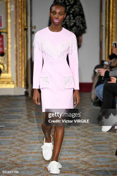 Model walks the runway at the Huishan Zhang Ready to Wear Fall/Winter 2018-2019 fashion show during London Fashion Week February 2018 on February 18,...