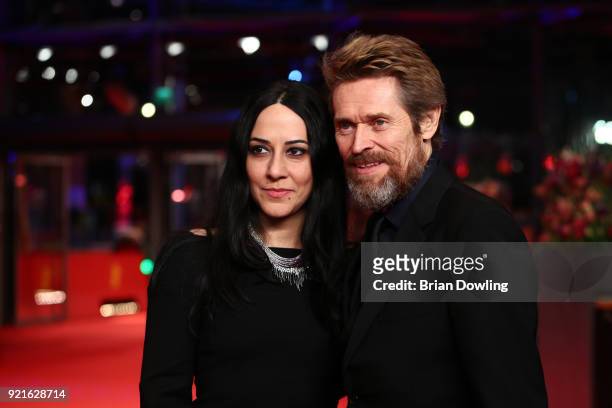 Willem Dafoe and his wife Giada Colagrande attend the Homage Willem Dafoe - Honorary Golden Bear award ceremony and 'The Hunter' screening during the...