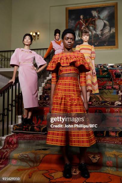 Models pose at the Tata Naka Presentation during London Fashion Week February 2018 on February 20, 2018 in London, England.