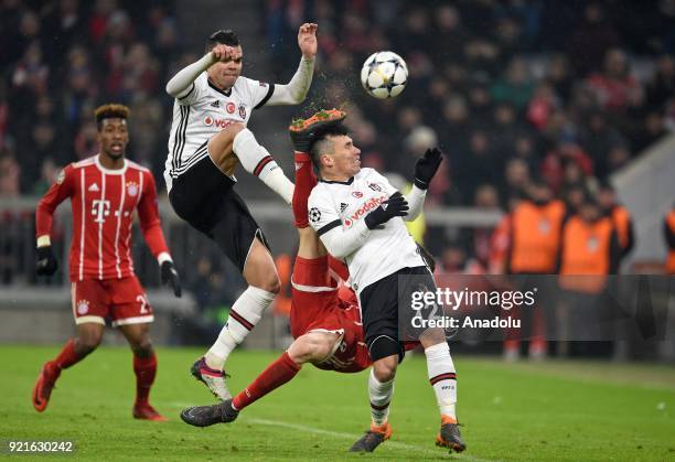 Robert Lewandowski of FC Bayern Munich in action against Pepe and Medel of Besiktas during the UEFA Champions League Round of 16 soccer match between...