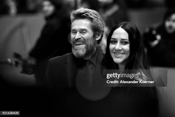 Willem Dafoe and his wife Giada Colagrande attend the Hommage Willem Dafoe - Honorary Golden Bear award ceremony and 'The Hunter' screening during...