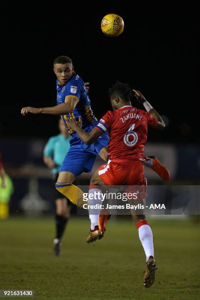 Carlton Morris of Shrewsbury Town and Gabriel Zakuani of Gillingham during the Sky Bet League One match between Shrewsbury Town and Gillingham at New...