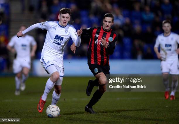 Ben Tollitt of Tranmere Rovers and David Fitzpatrick of Macclesfield Town in action during the Vanarama National League match between Tranmere Rovers...