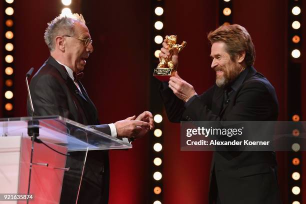 Willem Dafoe receives the Honorary Golden Bear from Festival director Dieter Kosslick at the Homage Willem Dafoe - Honorary Golden Bear award...