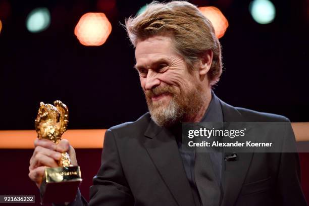 Honorary Golden Bear Winner Willem Dafoe poses with his award at the Homage Willem Dafoe - Honorary Golden Bear award ceremony and 'The Hunter'...