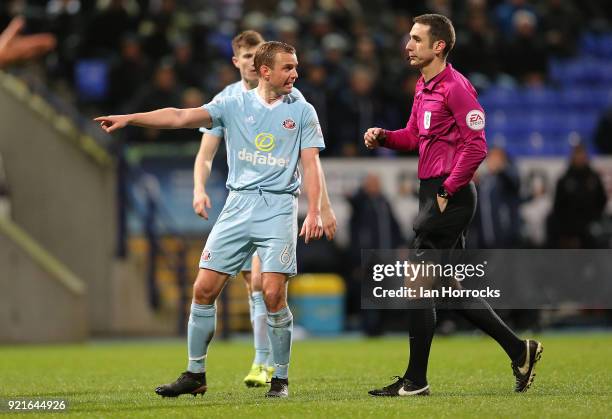 Lee Cattermole of Sunderland talks to the referee David Coote during the Sky Bet Championship match between Bolton Wanderers and Sunderland at Macron...