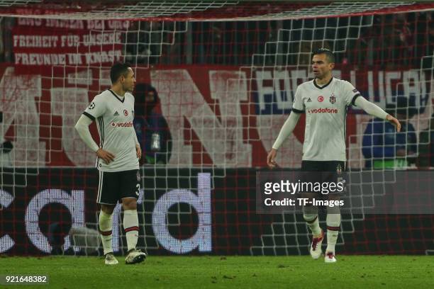 Adriano Correia of Besiktas Istanbul and Pepe of Besiktas Istanbul looks dejected during the UEFA Champions League Round of 16 First Leg match...
