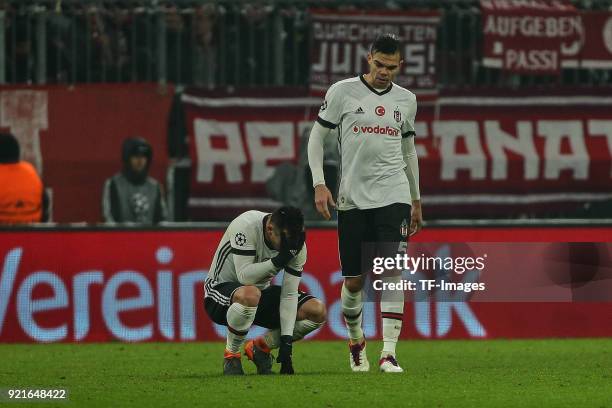 Gary Medel of Besiktas Istanbul and Pepe of Besiktas Istanbul looks dejected during the UEFA Champions League Round of 16 First Leg match between...