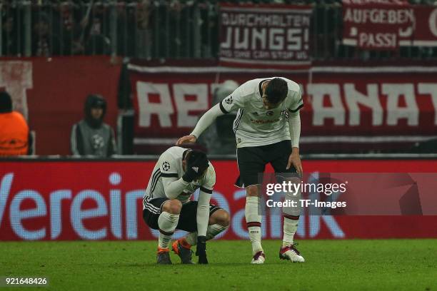 Gary Medel of Besiktas Istanbul and Pepe of Besiktas Istanbul looks dejected during the UEFA Champions League Round of 16 First Leg match between...
