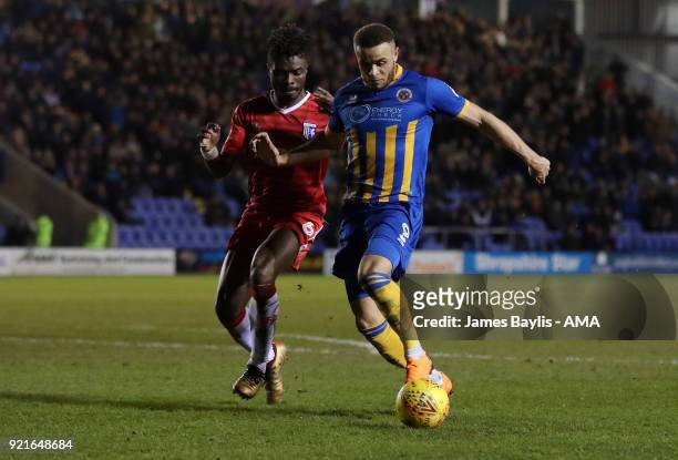 Gabriel Zakuani of Gillingham and Carlton Morris of Shrewsbury Town during the Sky Bet League One match between Shrewsbury Town and Gillingham at New...