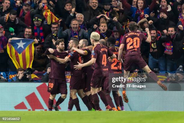 Lionel Messi of Barcelona celebrates after scoring his team`s first goal with team mates during the UEFA Champions League Round of 16 First Leg match...