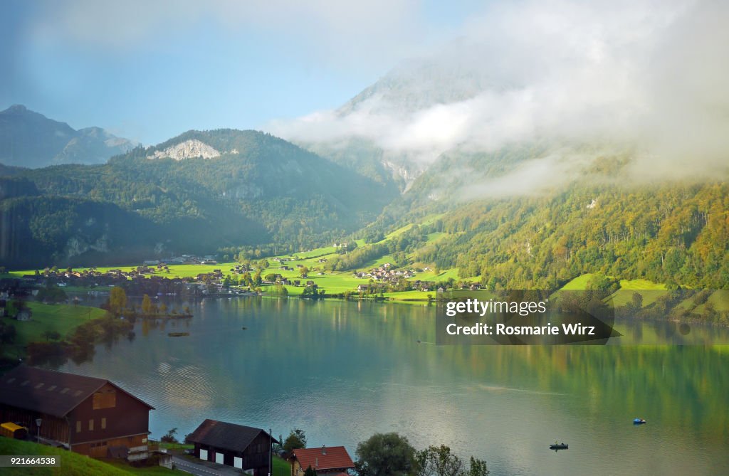 Lake Lungern scenery in early morning sun in autumn.