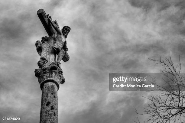 cross in a column in black and white - lastres stock pictures, royalty-free photos & images