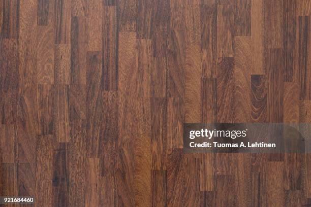 brown wood laminate flooring texture background in house. - parquet flottant photos et images de collection