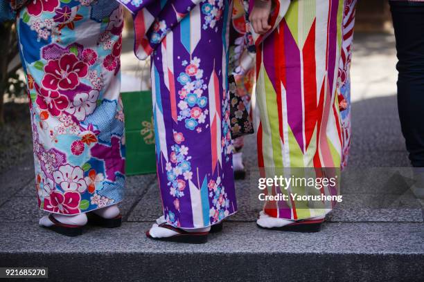 young girl wearing japanese kimono standing in front of sensoji temple in tokyo, japan. - heritage festival presented stock pictures, royalty-free photos & images