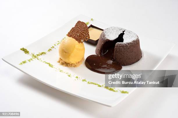 lava cake with ice cream - lava cake stock pictures, royalty-free photos & images