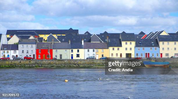 Ireland, Galway . Houses with colourful facades along Long Walk, viewed from Claddagh Quay.