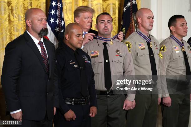 President Donald Trump presents the Public Safety Medal of Valor to District Attorney Investigator Chad Johnson, San Bernardino County District...