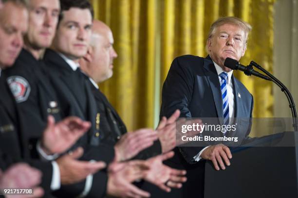 President Donald Trump pauses while speaking during a Public Safety Medal of Valor awards ceremony in the East Room of the White House in Washington,...