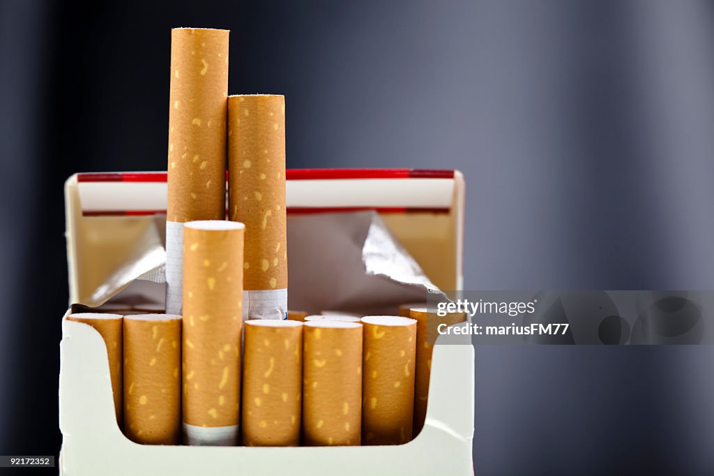 An up close view of a package of several cigarettes