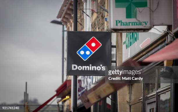 Branch of Domino's pizza takeaway is pictured on February 19, 2018 in Bath, England. The number of takeaway restaurants has increased significantly...