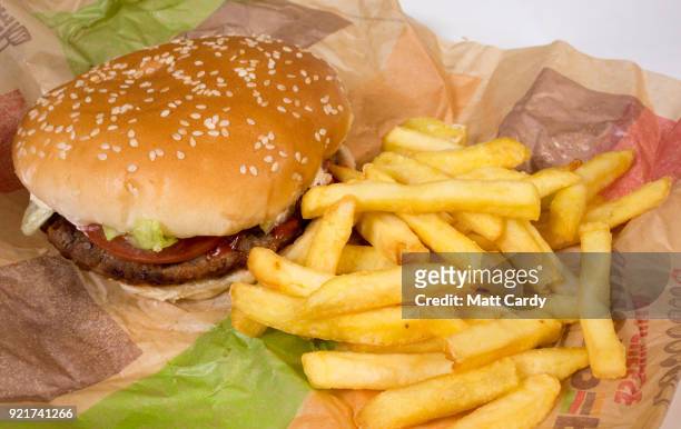 In this photo illustration, fast food from a branch of Burger King is pictured on February 20, 2018 in Bristol, England. The number of takeaway...