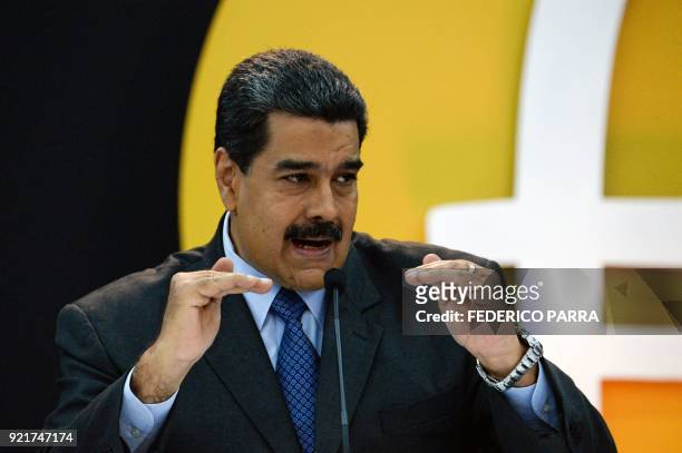 Venezuela's President Nicolas Maduro delivers a speach during a press conference to launch to the market a new oil-backed cryptocurrency called...